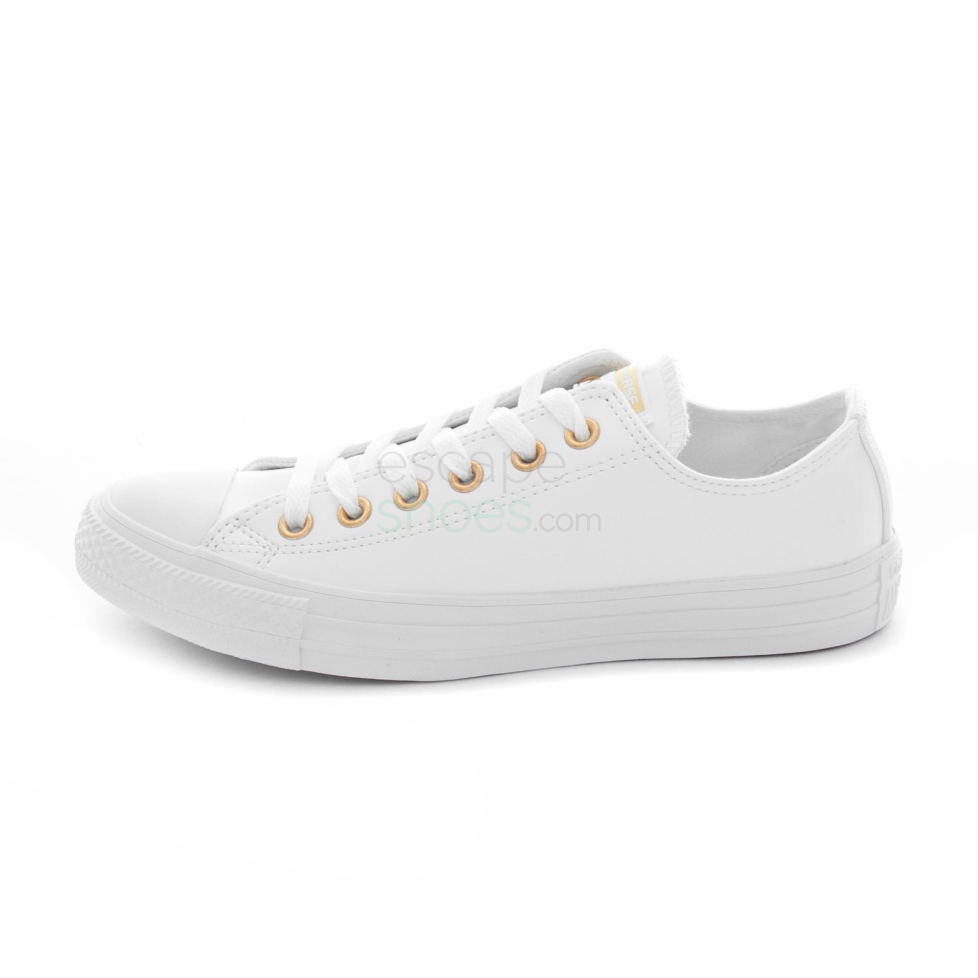 white converse with gold tongue
