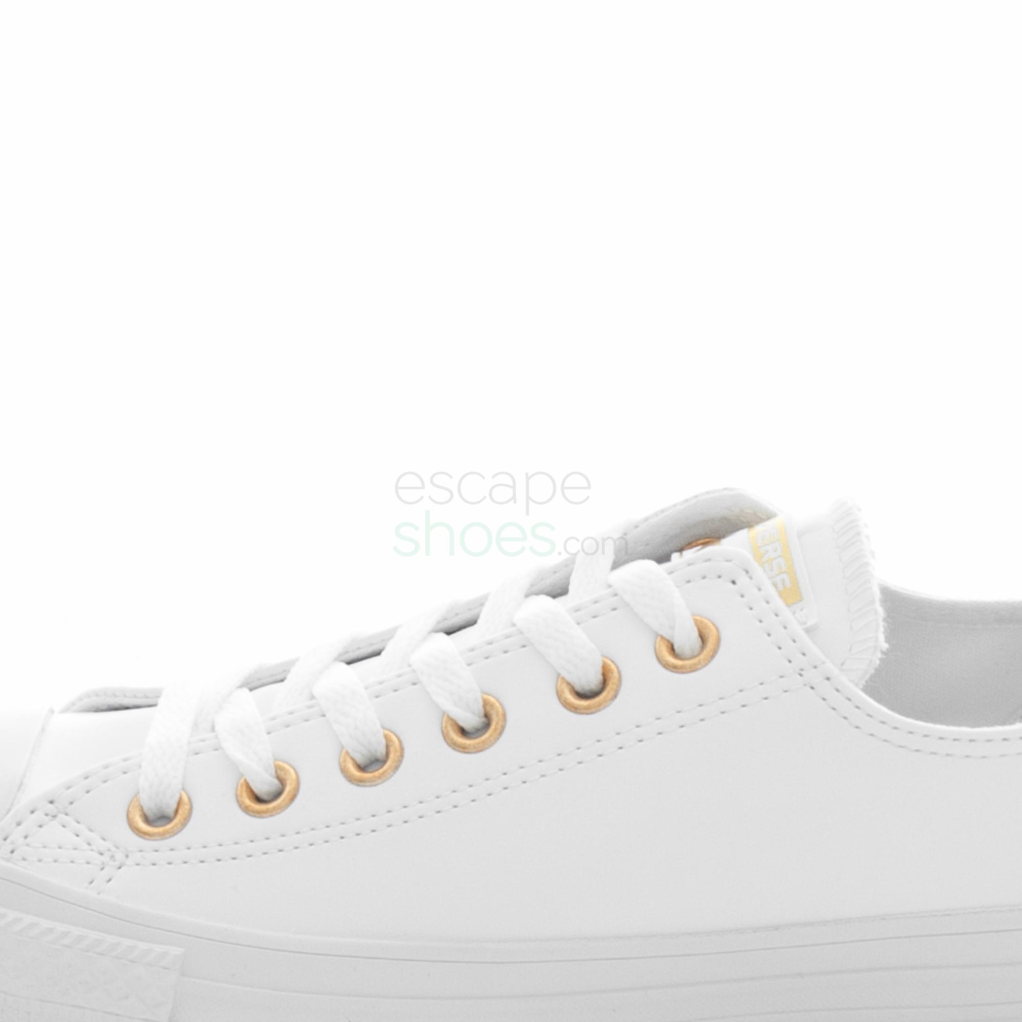 gold converse tennis shoes