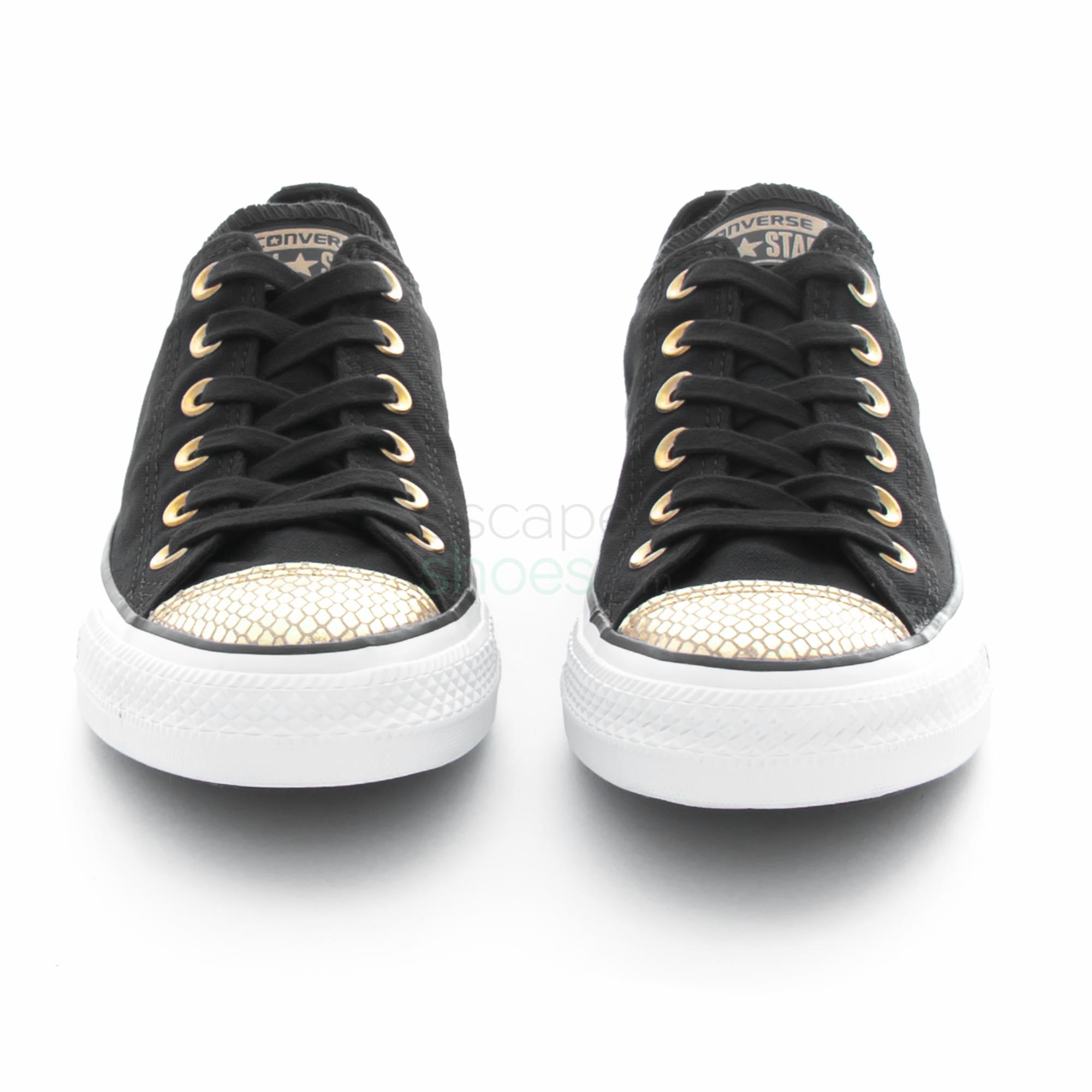converse gold and black